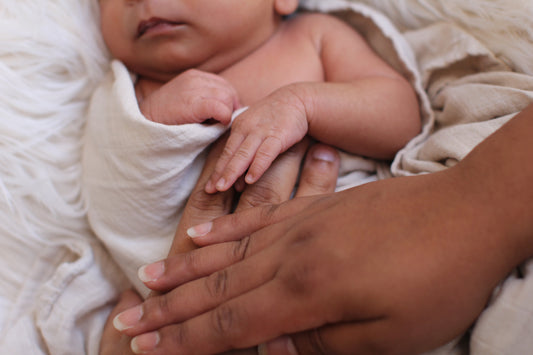 Safe in your hands-Newborn portrait by Barbara Lardera